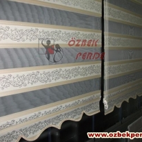 cam-balkona-gumus-renkli-sarmasik-zebra-perde-modeli