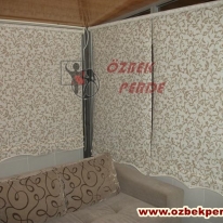 kahverenkli-sarmasik-baskili-stor-perde