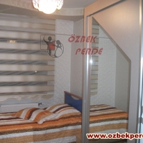 genis-golge-pliseli-krem-zebra-perde-modeli