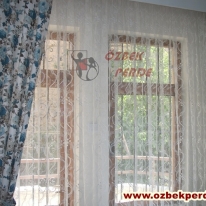 mavi-renkli-popart-kanatli-tul-perde-gorseli