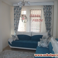 mavi-renkli-popart-kanatli-tul-perde-modeli