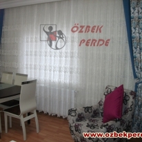 turkuaz-renkli-popart-kanatli-fon-perde-modeli