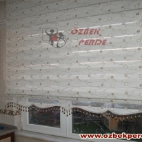 kahve-krem-renkli-ponpon-zebra-perde