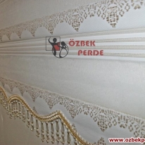 sarkac-pliseli-altin-zebra-perde-alti-etekli