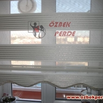 sirma-pliseli-gumus-renkli-zebra-perde