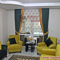 kahve-gullu-brillant-lotus-tul-stor-perde-gorseli