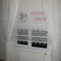 yaprakli-tulden-kanatli-tul-stor-perde-modeli