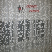 ekru-renkli-perforje-tul-perde-gorseli